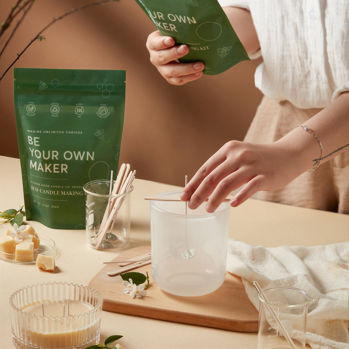 Living Good Candle Co. Eco Candle Making Kit with beeswax, wicks, and a reusable jar for making DIY candles at home.