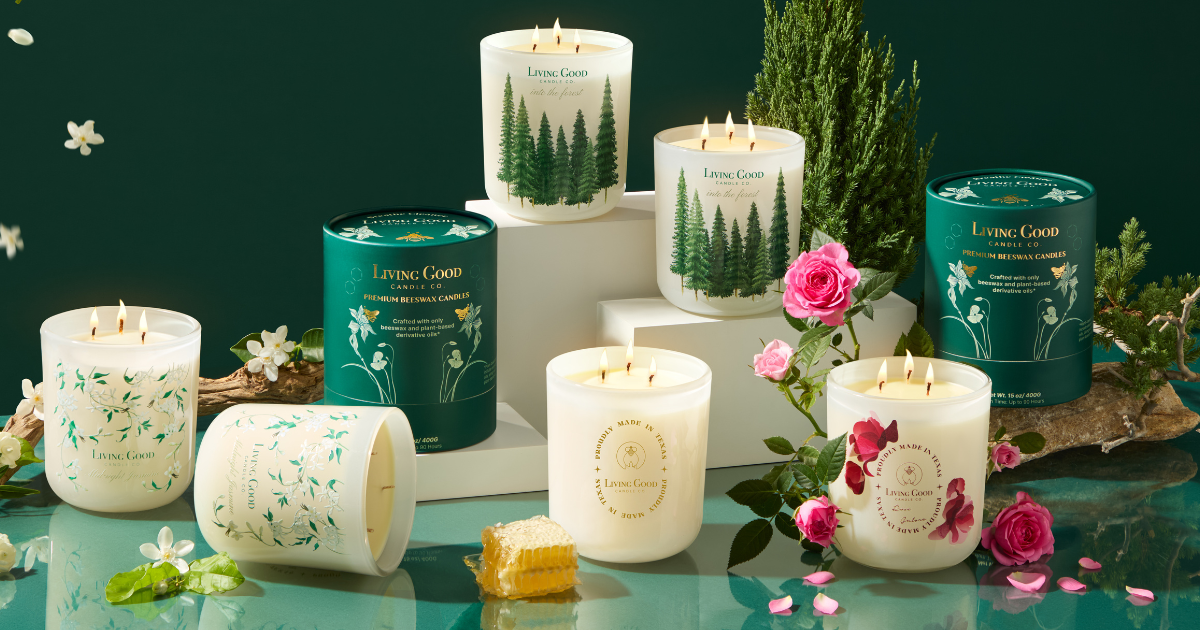 Collection of natural beeswax candles from Living Good Candle Co., featuring a variety of clean-burning scents in reusable glass jars and eco-conscious packaging.