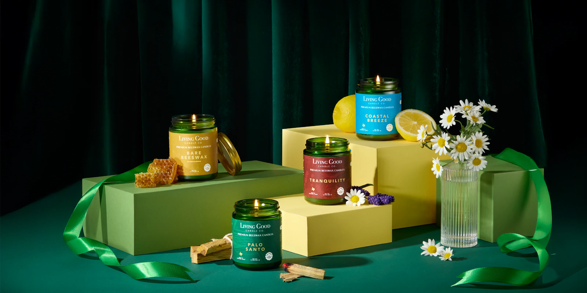 Living Good Candle Co. 5.5 oz beeswax candles in Bare Beeswax, Palo Santo, Tranquility, and Coastal Breeze scents.