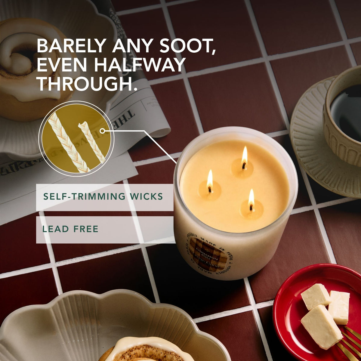 Living Good Candle Co.'s Cinnamon Roll 15 oz beeswax candle with three lit self-trimming, lead-free wicks and minimal visible soot.