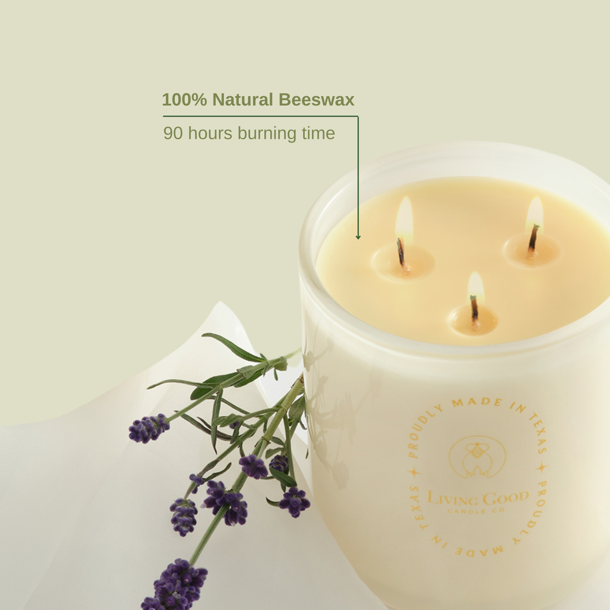 Claricomb beeswax candle with three lit wicks showing 100% natural beeswax and a 90-hour burning time