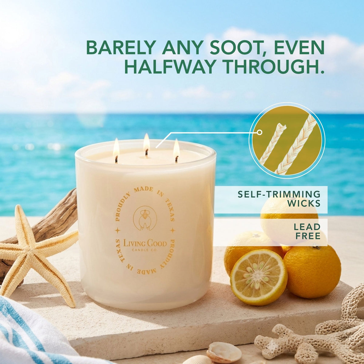 Coastal Breeze beeswax candle with three lit wicks beside citrus and coastal decor, highlighting self-trimming wicks