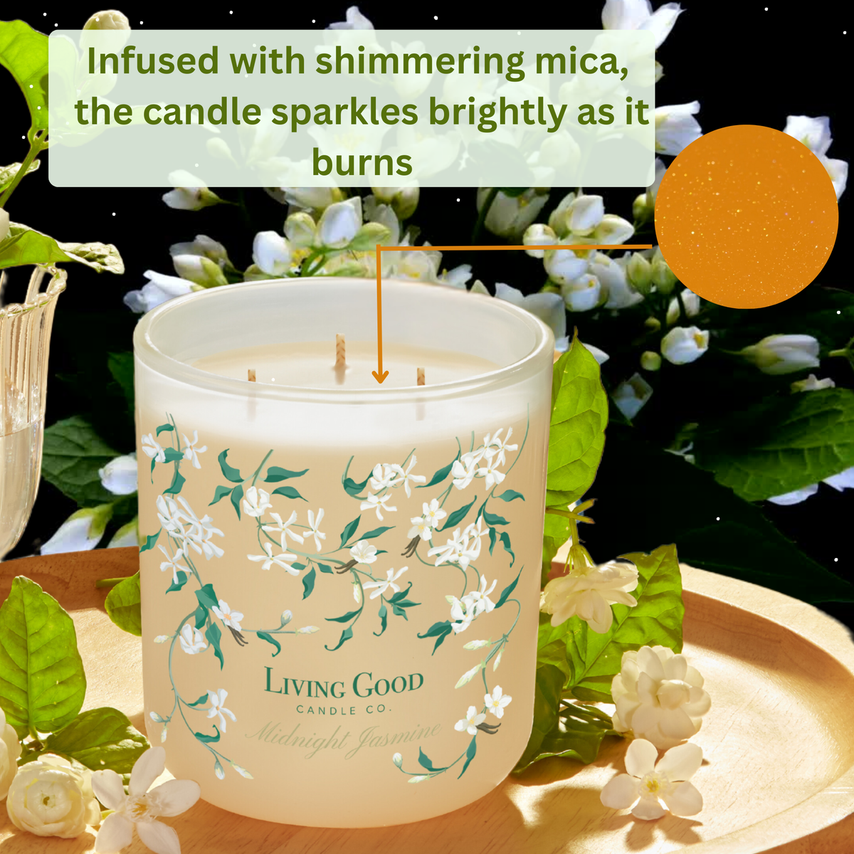 Midnight Jasmine beeswax candle surrounded by jasmine blossoms with text describing a shimmering mica sparkle effect.