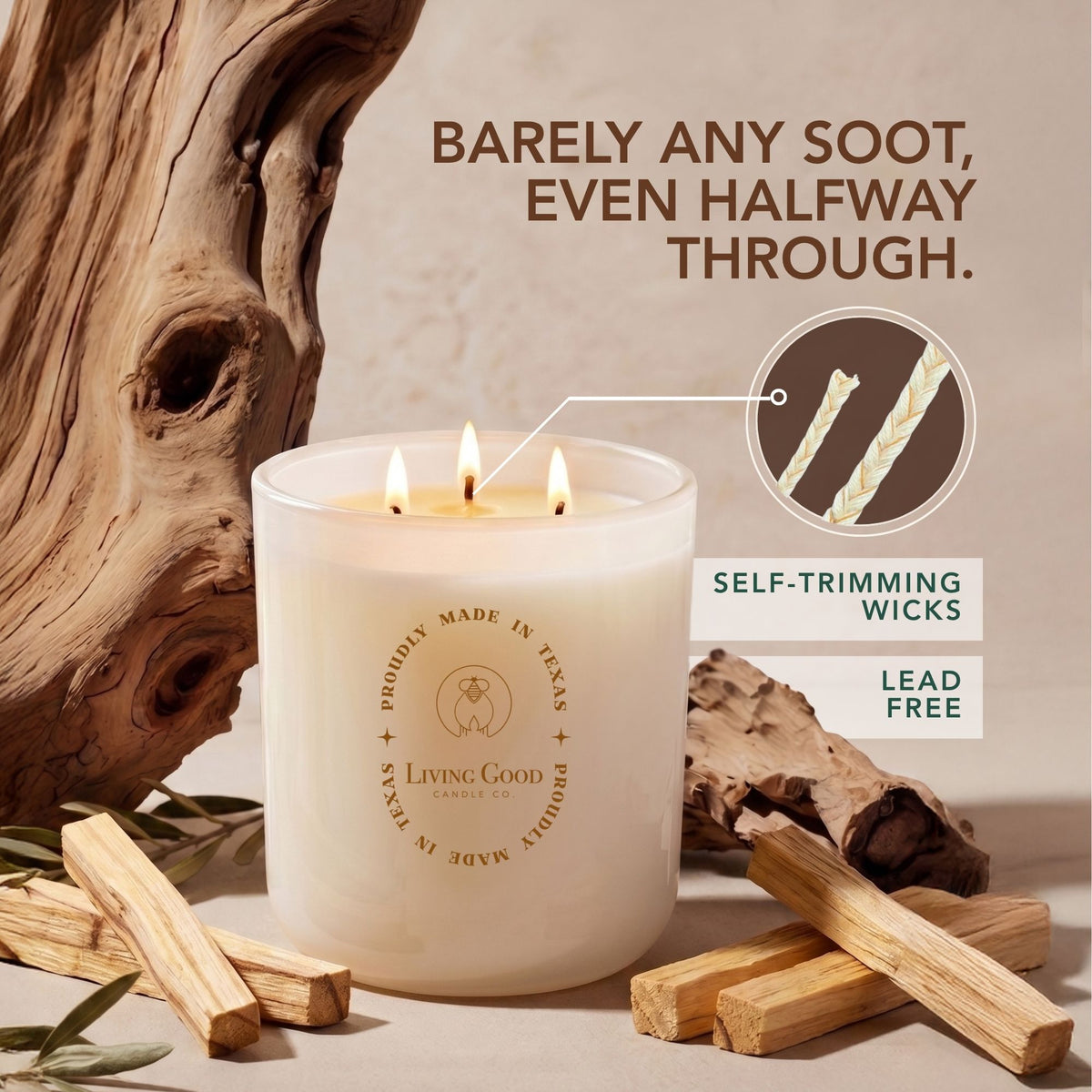 Living Good Palo Santo beeswax candle with three self-trimming lead-free wicks surrounded by natural wood pieces.