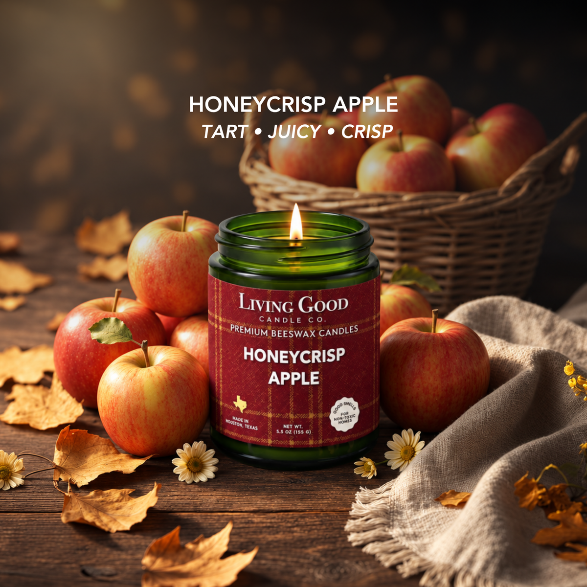 Honeycrisp Apple beeswax candle in a cozy fall setting with fresh apples, highlighting its tart, juicy, crisp scent profile.