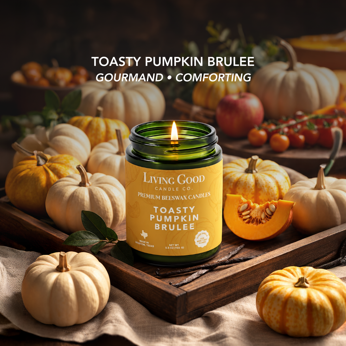 Toasty Pumpkin Brulee beeswax candle surrounded by pumpkins in a cozy fall setting highlighting its comforting gourmand scent.