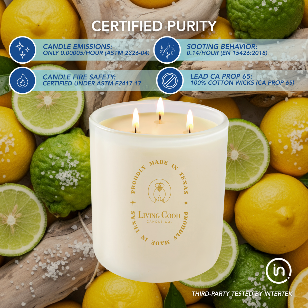Coastal Breeze beeswax candle with three lit wicks surrounded by lemons, limes, and sea salt