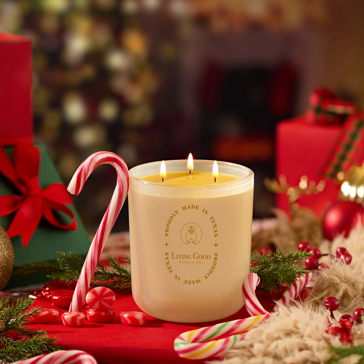Merrymint beeswax candle with candy canes and Christmas decorations in a festive holiday setting