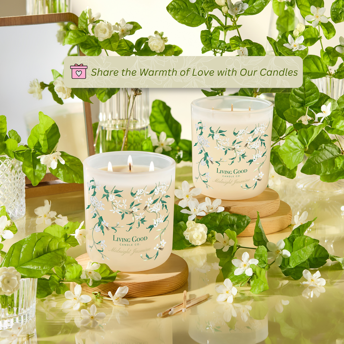 Two Midnight Jasmine beeswax candles displayed among jasmine flowers as a romantic and giftable floral candle set.